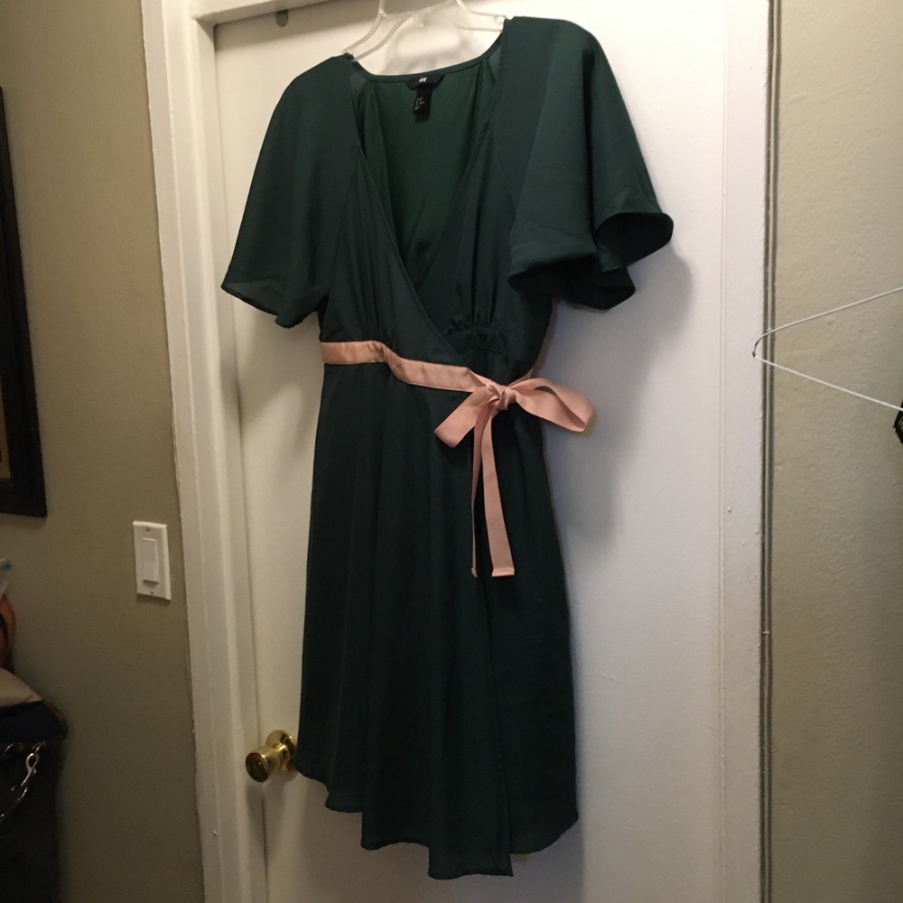Green wrap dress with pink bow